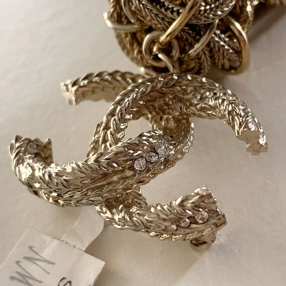 Chanel large tassel brooch in gold with crystals